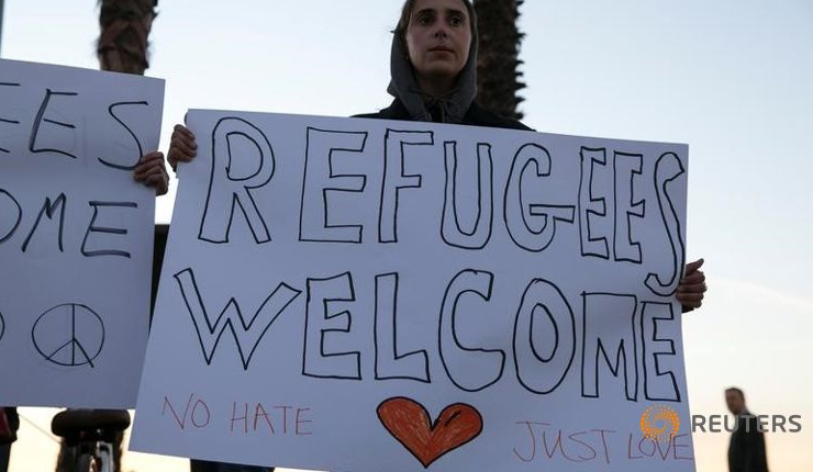 Trump administration to allow 872 refugees into U.S. this week